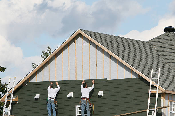 Professional Emergency Siding Repair technician working in Linwood, NC